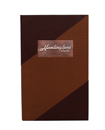 two tone angled suede menu cover with copper tip-in logo.